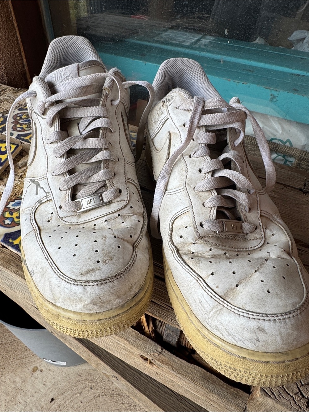 Nike White Leather Low-Top Sneakers with Yellowed Soles